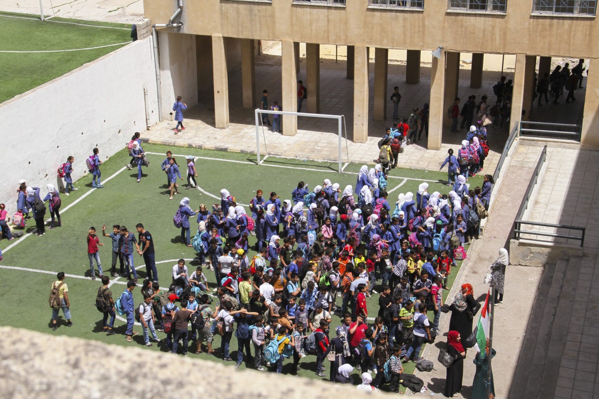 After the welcoming ritual, the students enter the school lined up by class, one after another in a disciplined manner.