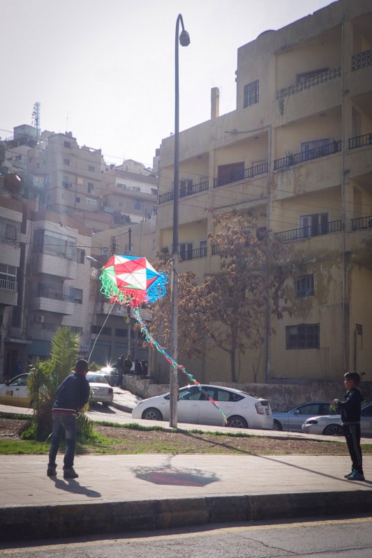 If the weather cooperates you can see children playing with their hexagon kites on street corners.