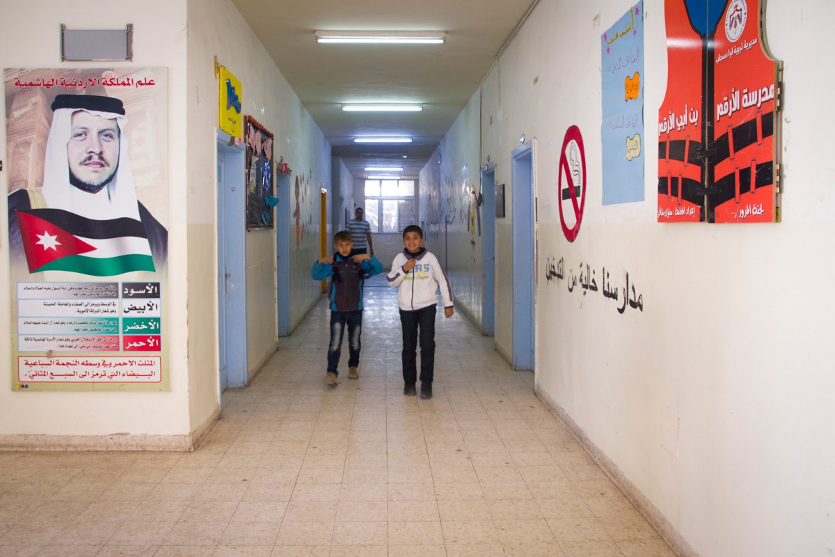 The King of Jordan is omnipresent at this school: a portrait of him is hanging on the hall wall at the entrance.